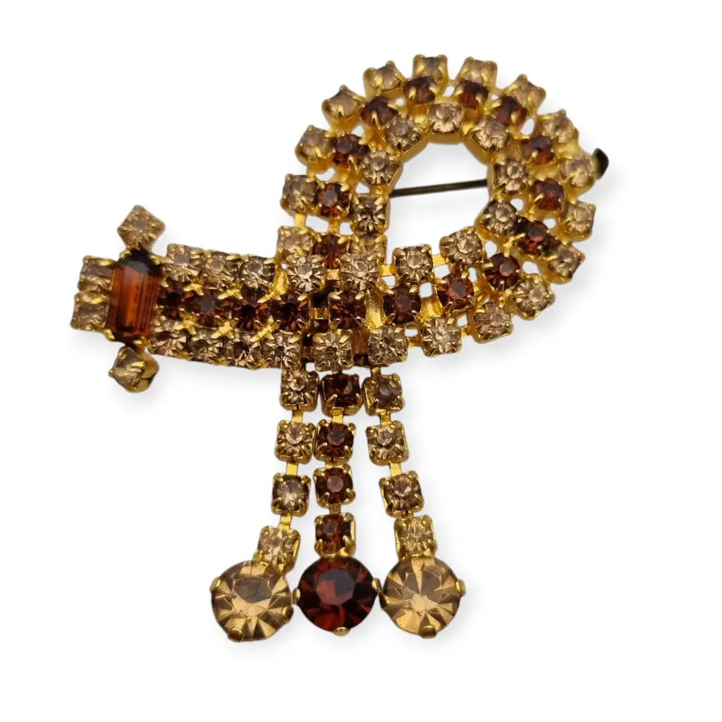 Vintage women's art deco brooch, brown cascading rhinestone cluster, 1960.