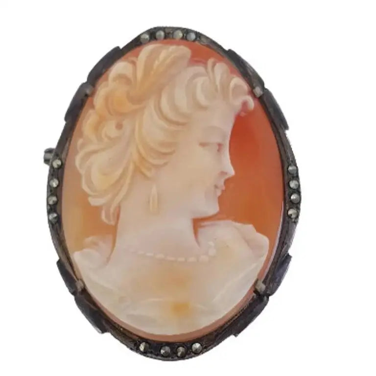 Antique silver cameo brooch, carved shell decorated with marquisitas.