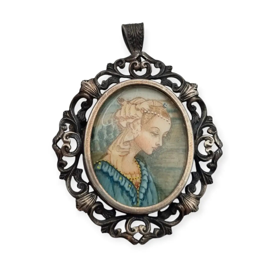 Antique pendant brooch in 800 silver with a painted miniature of a Renaissance lady.