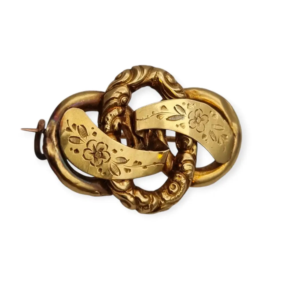 Victorian bow brooch 14k gold with engraved floral design, 1900.