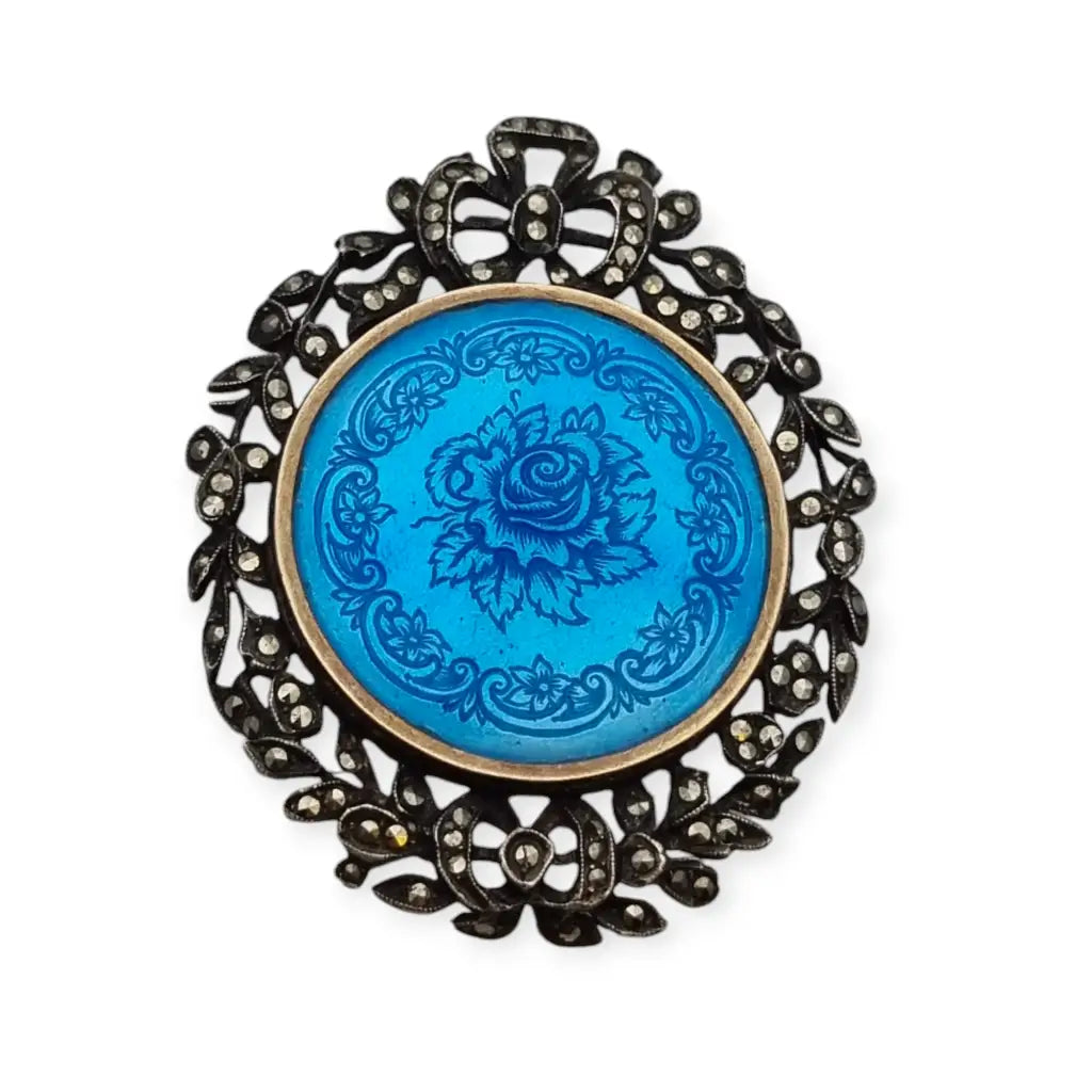 Silver and blue enamel brooch with marquise flowers, Victorian style.