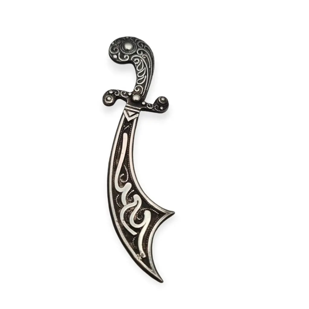 Scimitar-shaped silver brooch, ornamentation, vintage gifts.